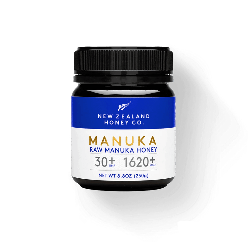 New Zealand Honey Co. UMF™ 30+ Manuka Honey jar with MGO 1620+, 250g, featuring a blue and white label showcasing premium, rare, and potent honey harvested from New Zealand.