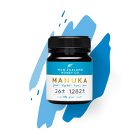 Manuka Honey Minis UMF 26+ MGO 1282+ jar styled on blue background