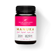 Honeycomb being uncapped, illustrating Natural Raw UMF 20+ MGO 829+ Manuka honey
