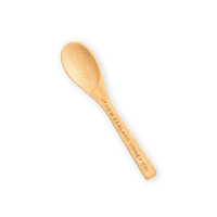 Single bamboo Daily Spoon engraved with New Zealand Honey Co. branding