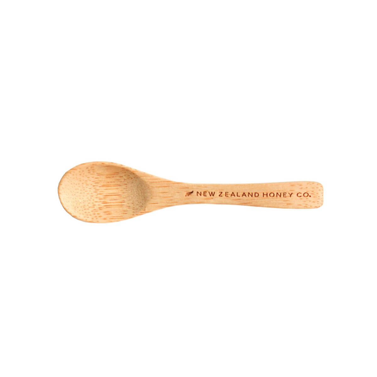 Top-down view of the bamboo Daily Spoon engraved with New Zealand Honey Co.
