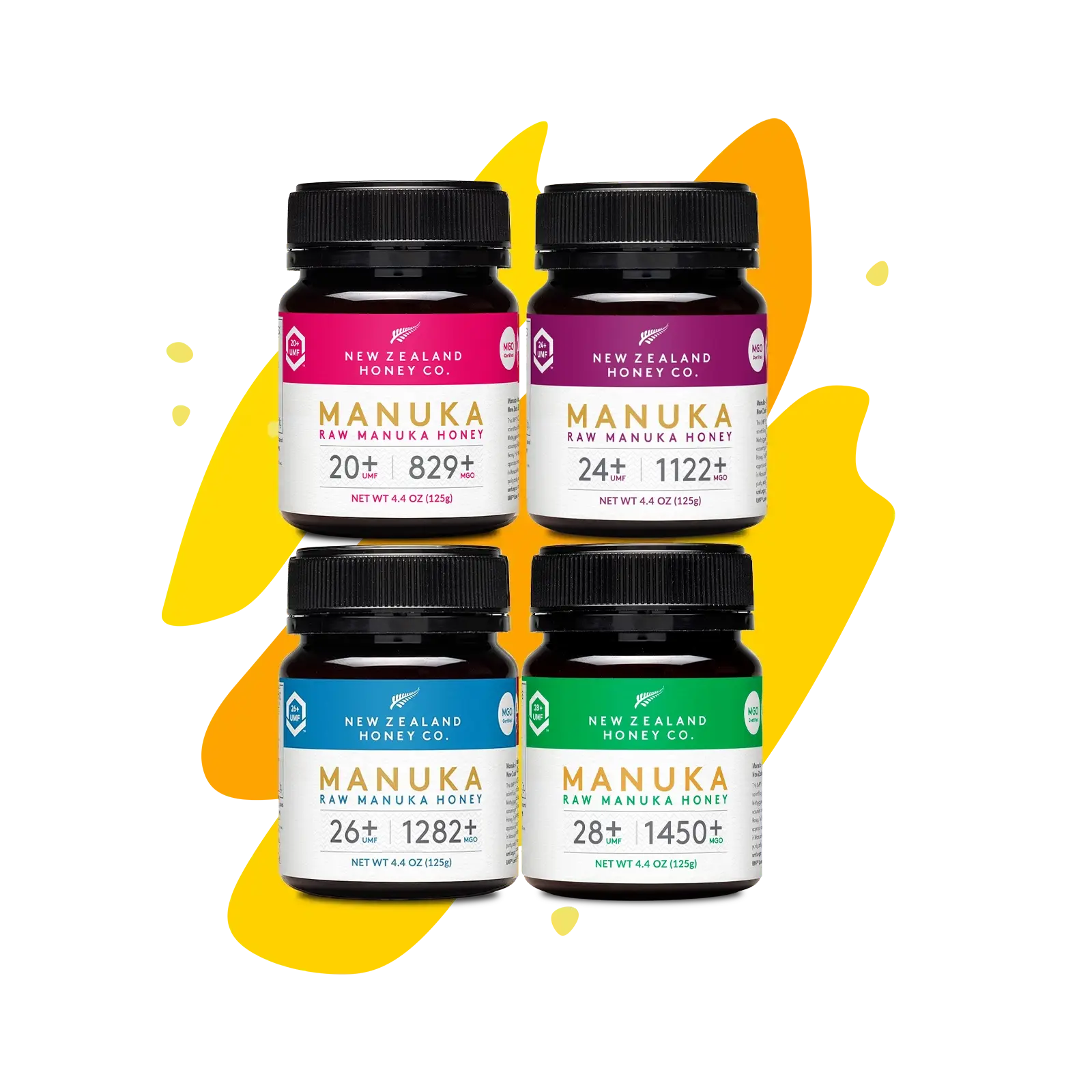 Four Manuka Honey Minis jars (UMF 20+, 24+, 26+, 28+) on yellow splash background